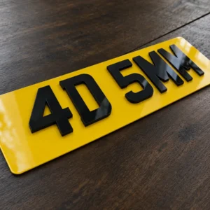 Yellow number plate with thick 5mm 4D acrylic characters reading 4D 5MM